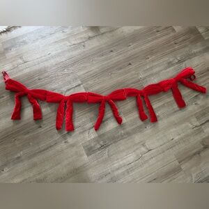 Red velvet bow garland